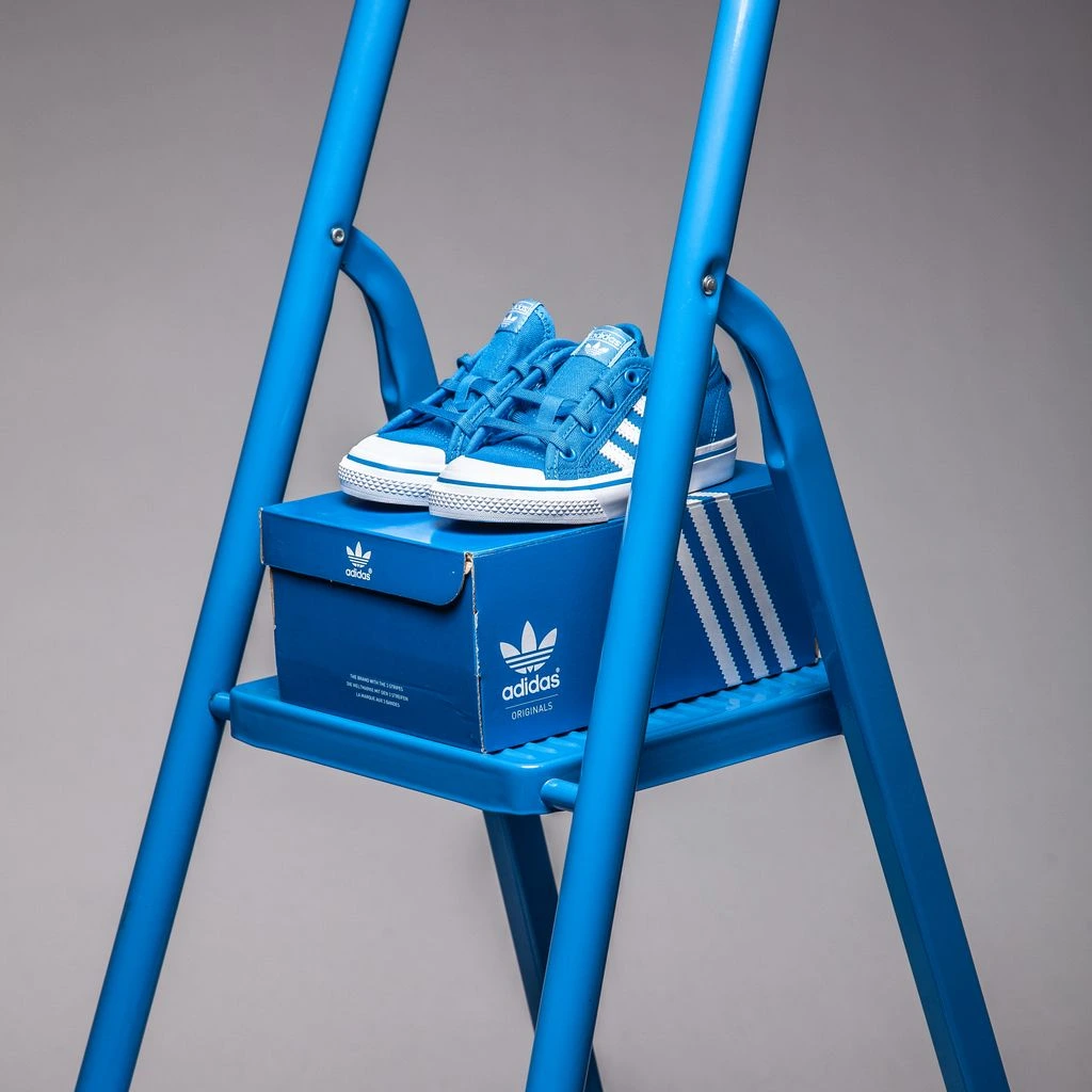 adidas Gazelle Indoor in navy suede with gum sole.